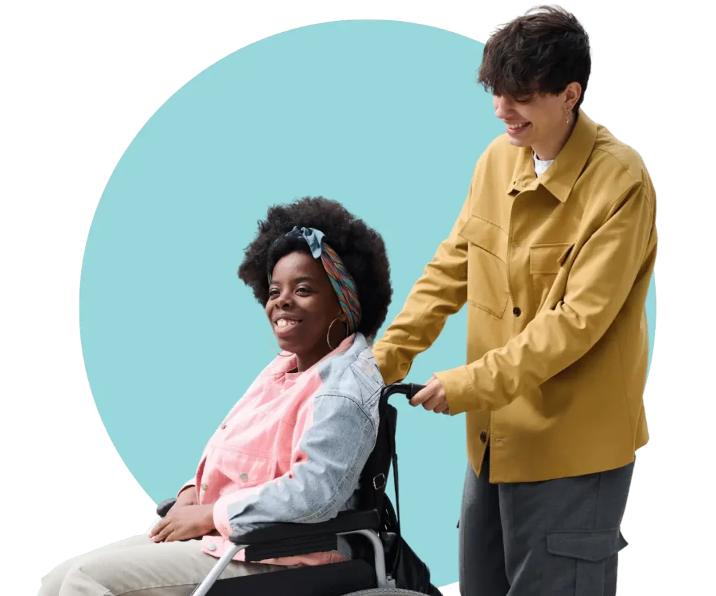Teen helping a disabled person in a Wheelchair