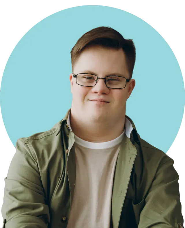 Disabled man with down syndrome smiling happily at the camera